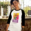 A young woman wearing a Stop The Judgment Project 3/4 sleeve raglan style shirt