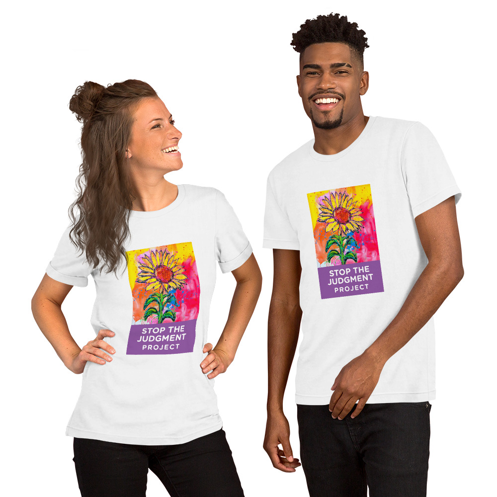 Young couple wearing Stop The Judgment t-shirt