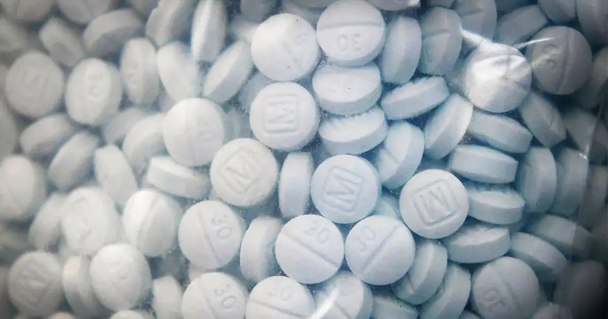 A close up photo of fentanyl pills, tablets